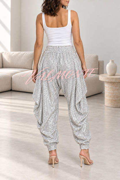 Pantalones harem holgados con cintura elástica y lentejuelas, de estilo tradicional nacional.