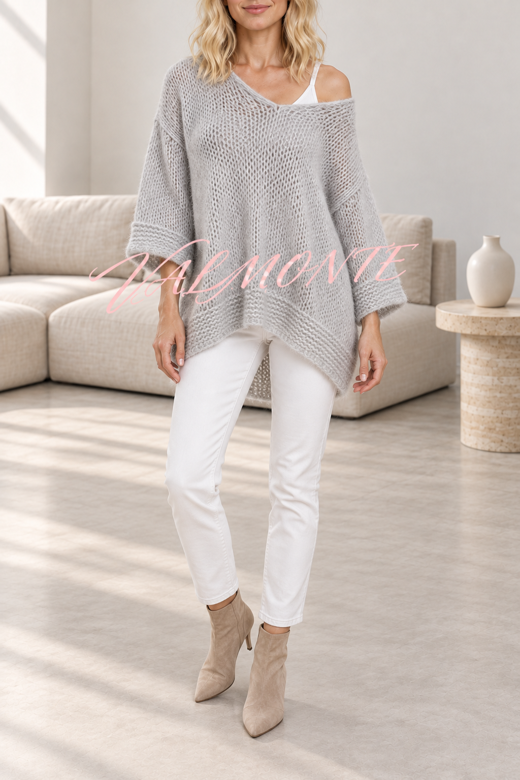 Jersey informal de punto, de color liso y con cuello en V holgado