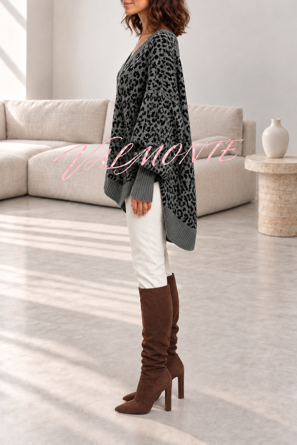 Jersey holgado de leopardo con cuello en V y mangas de murciélago
