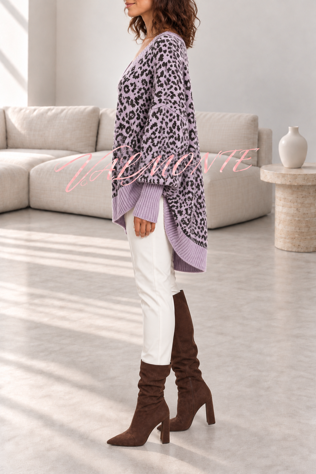 Jersey holgado de leopardo con cuello en V y mangas de murciélago